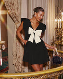 All Wrapped Up Bow Babydoll Mini Dress