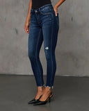 Jaylen Mid Rise Distressed Skinny Jeans