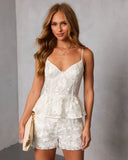 Midnight Renewal Embroidered Peplum Top