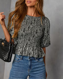 Crestal Puff Sleeve Peplum Top